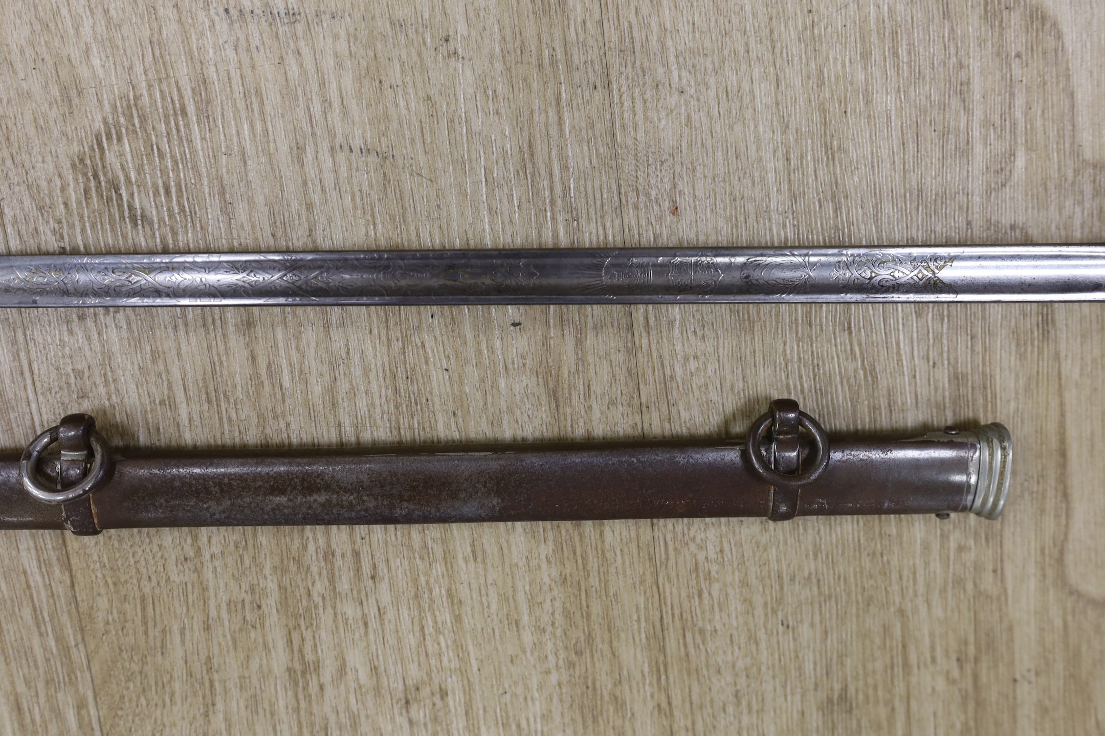 A George V officers sword with scabbard and a bayonet, sword100cm long
